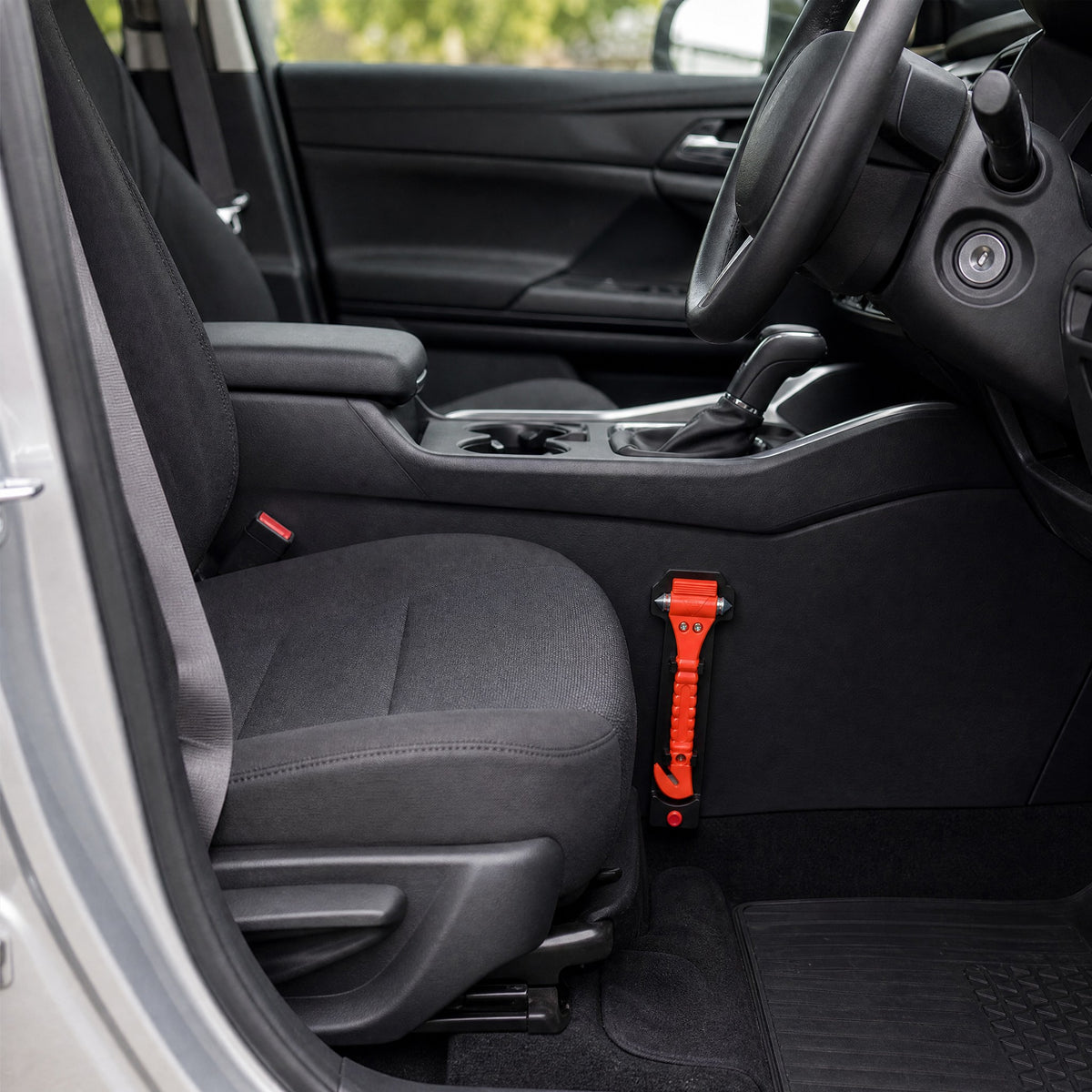 Escape tool mounted on the driver's side of the centre console in a right-hand-drive car