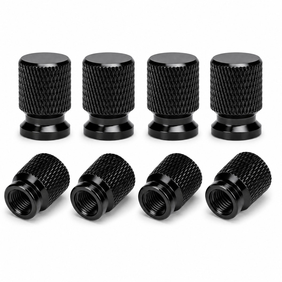 Pack of eight black anodised aluminium tyre valve caps with diamond knurled grip