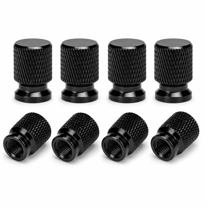 Pack of eight black anodised aluminium tyre valve caps with diamond knurled grip
